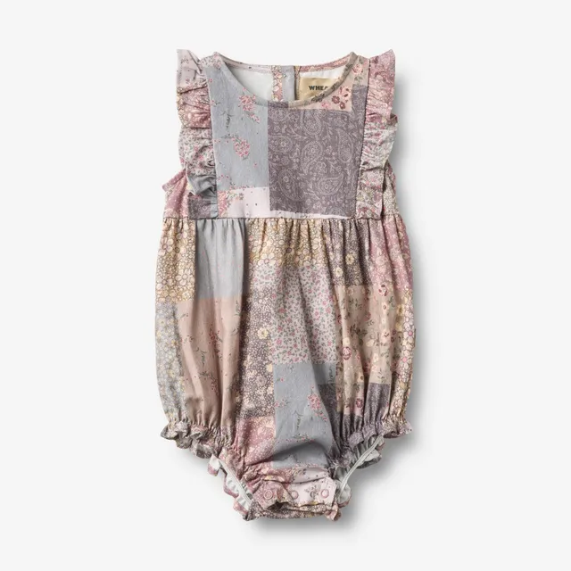 wheat-romper-emmaline-patchwork-flowers-strampler-bio image 1