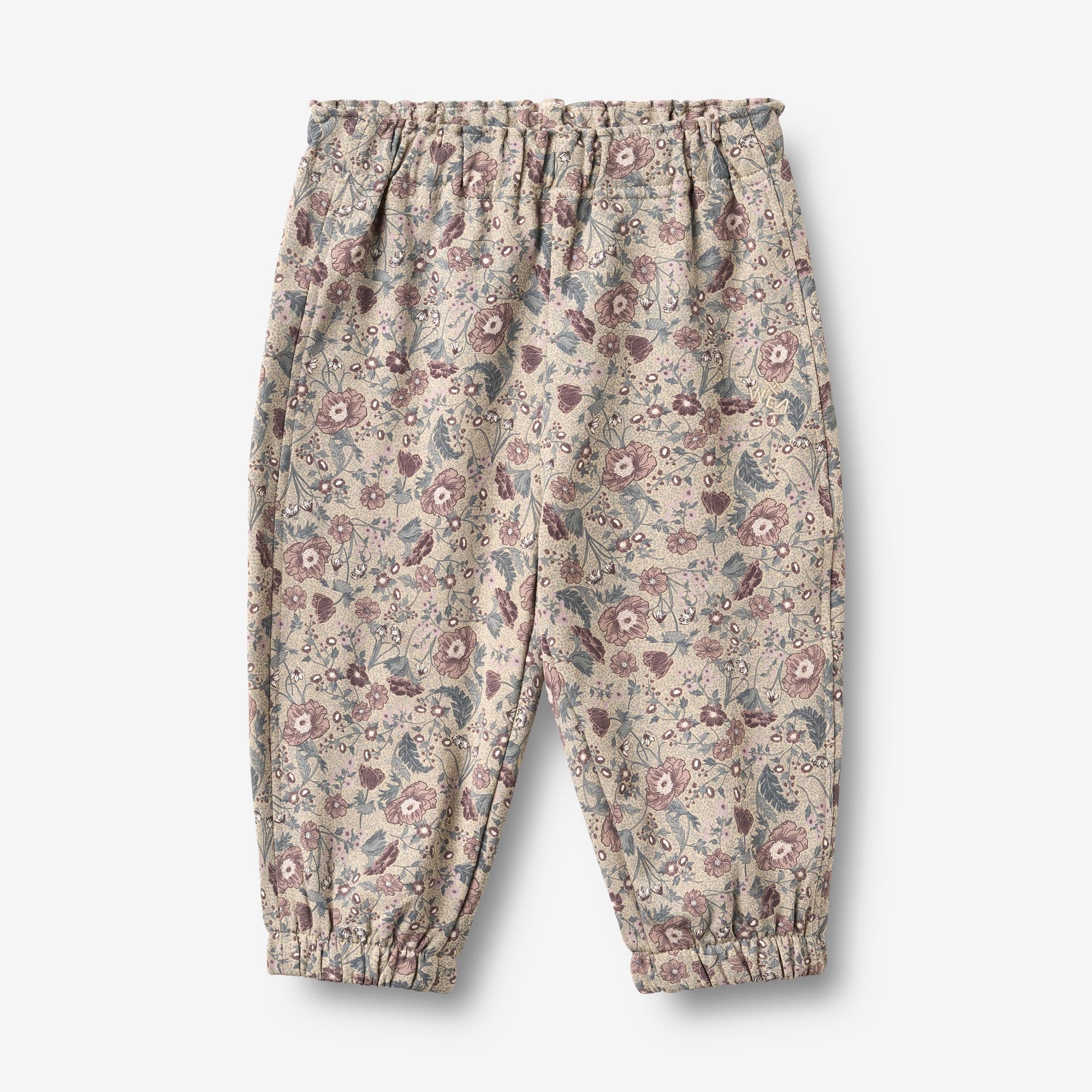 wheat-cosmo-sweatpants-baby-jogginghose-soft-sand-flowers image 1
