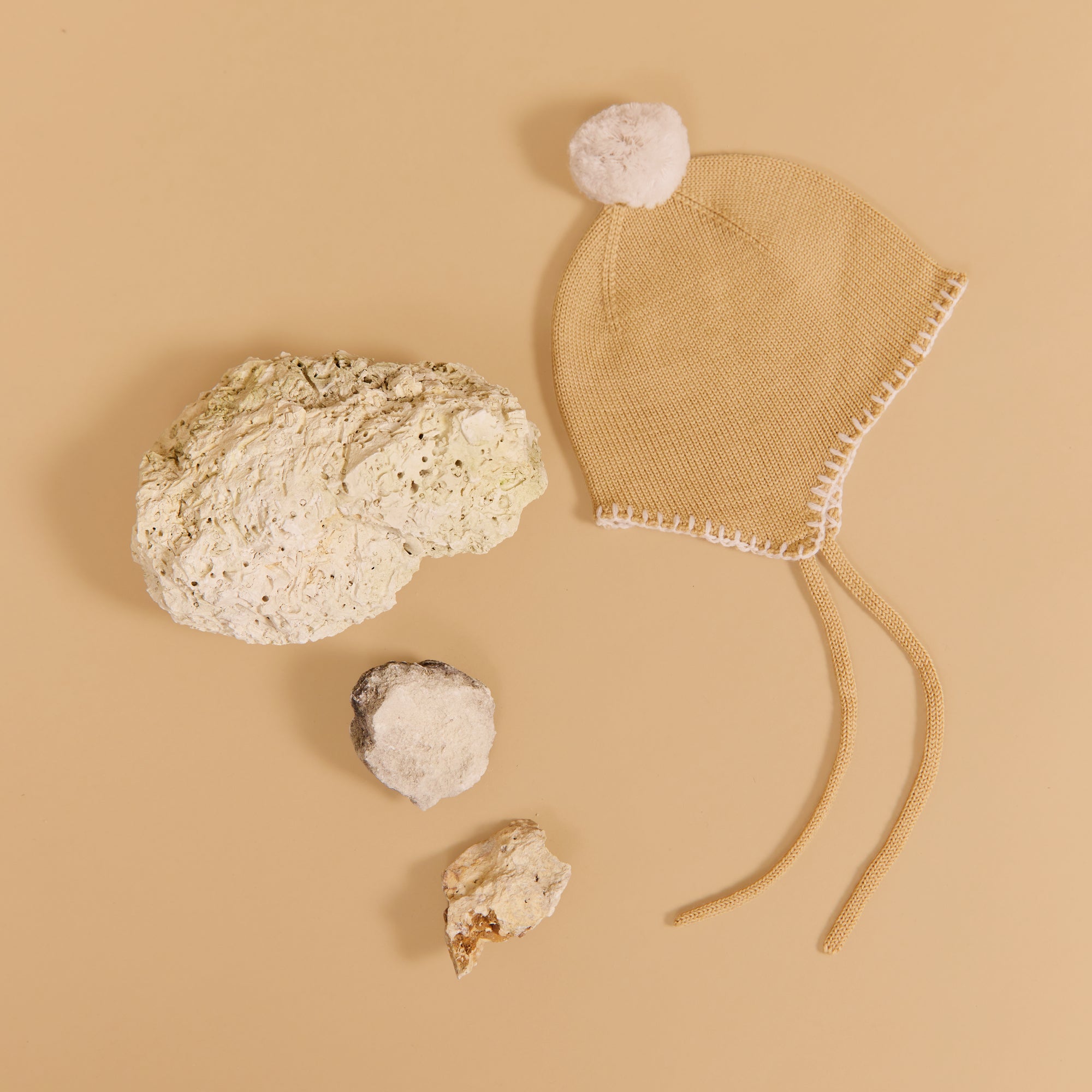 wheat-pomma-strickm-tze-honey-peach-merinowolle-baby image 3