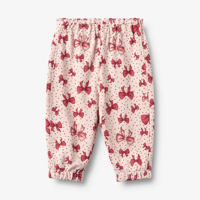 wheat-clothing-sweatpants-cosmo-hose-almond-peach-bows-bio image 1