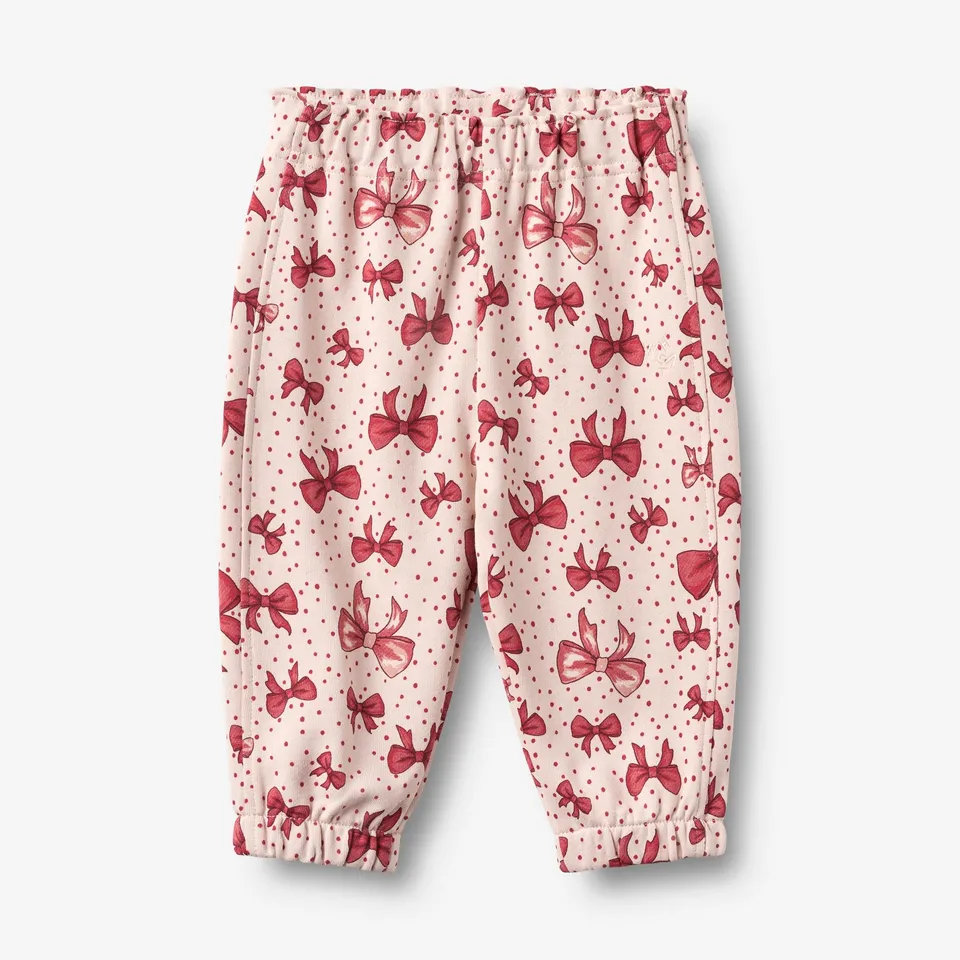 wheat-clothing-sweatpants-cosmo-hose-almond-peach-bows-bio image 1