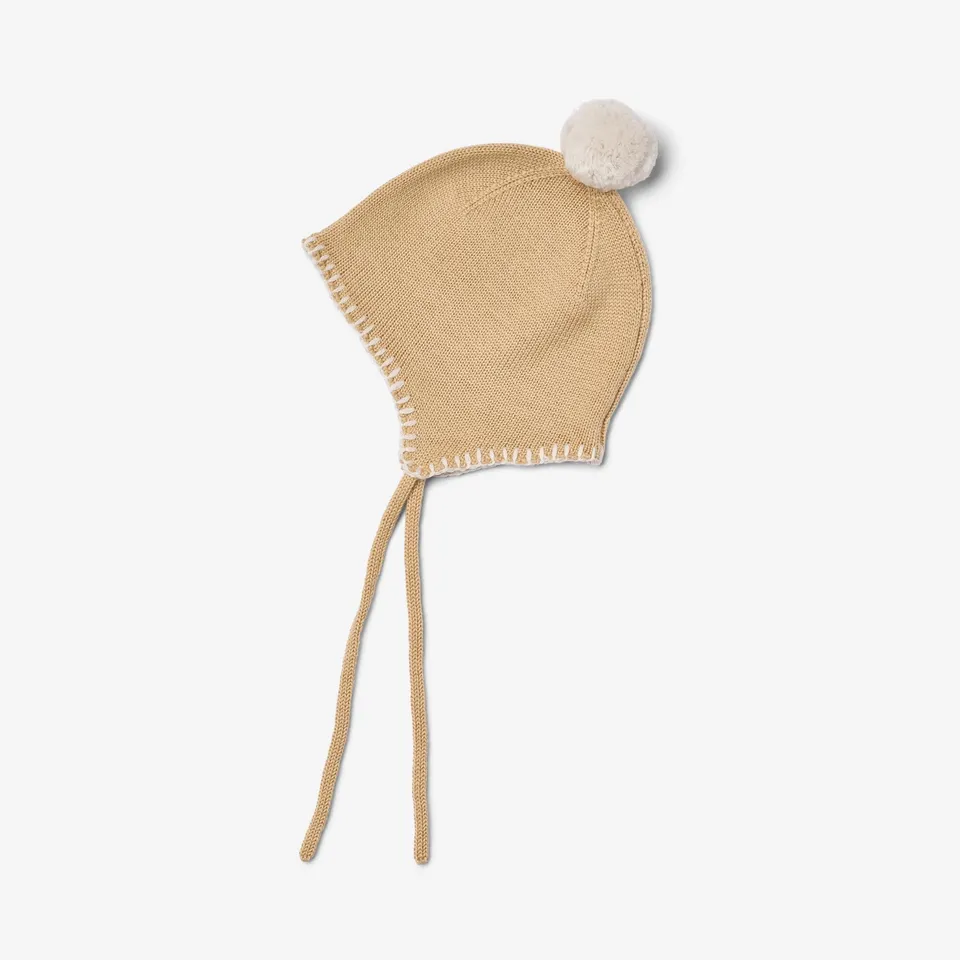 wheat-pomma-strickm-tze-honey-peach-merinowolle-baby image 1