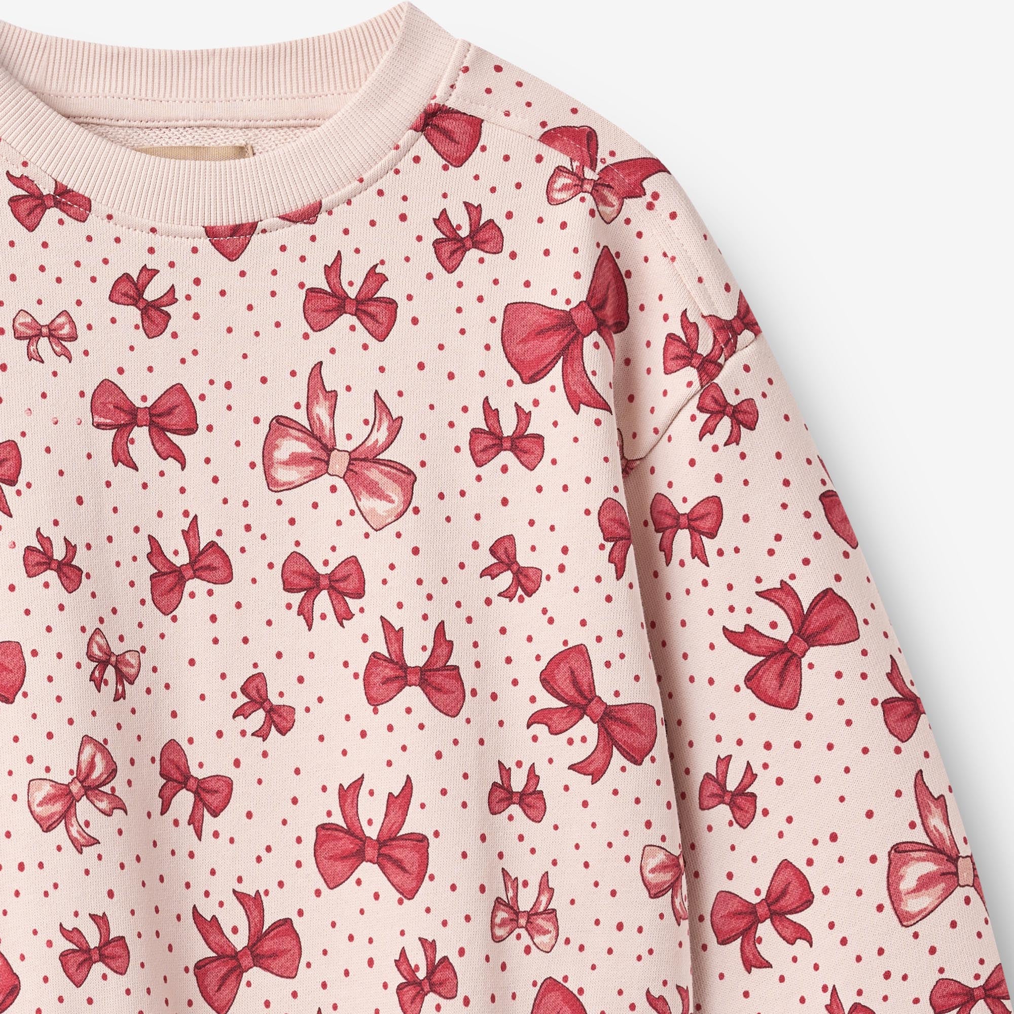 wheat-maggie-sweatkleid-almond-peach-bows-bio-baumwolle image 3