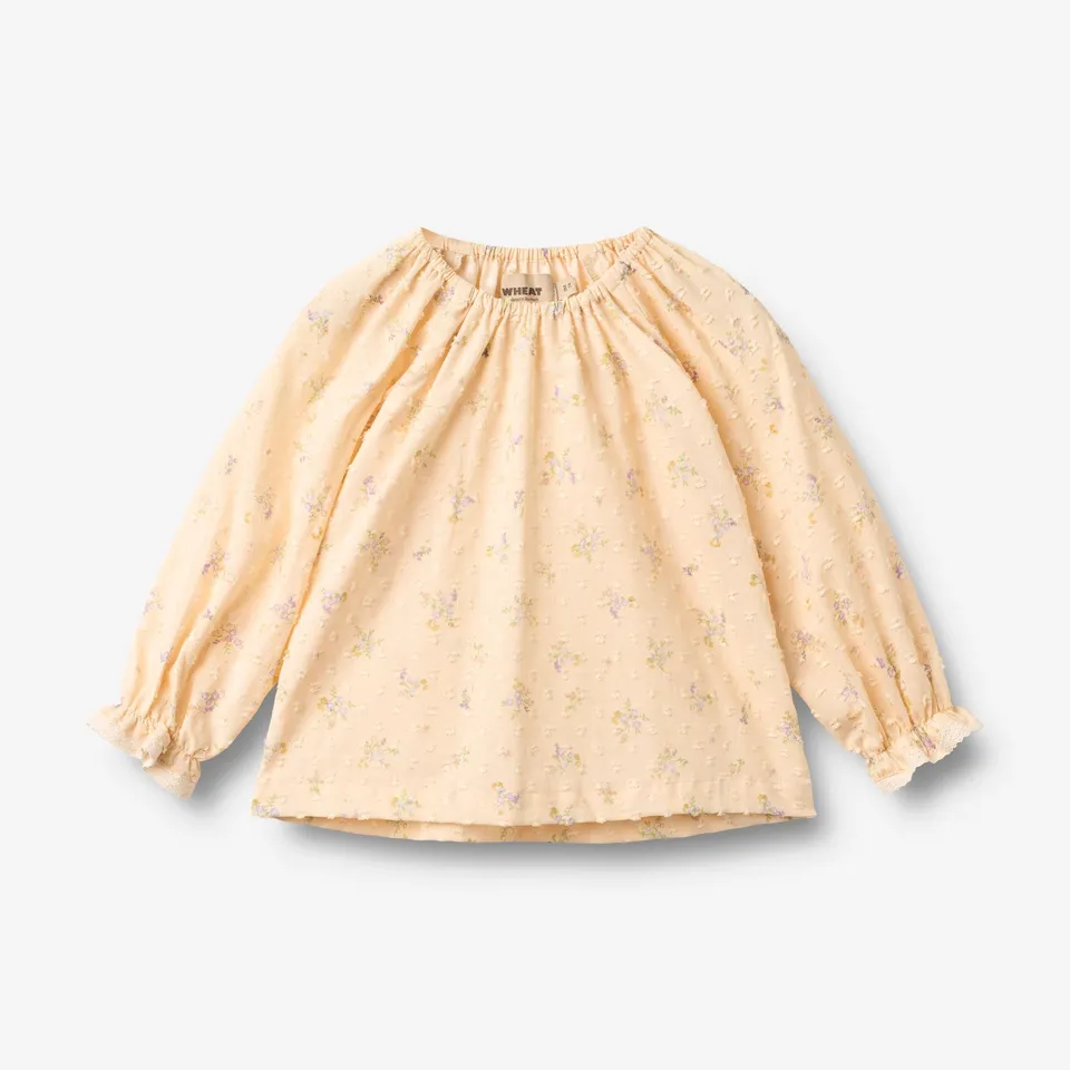 wheat-merle-barely-apricot-langarm-bluse-baby-bio-blumen image 1