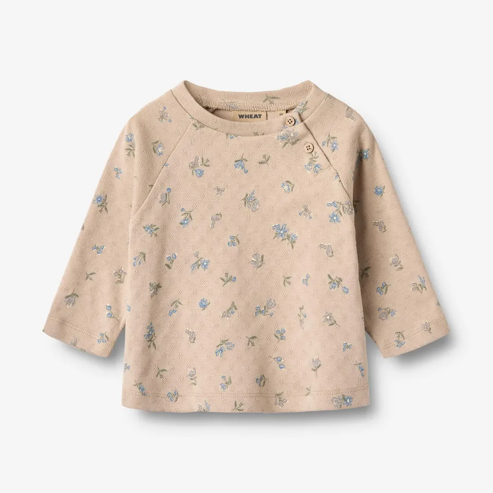 wheat-darrin-t-shirt-l-s-warm-sand-flowers-baby-langarmshirt-bio image 1