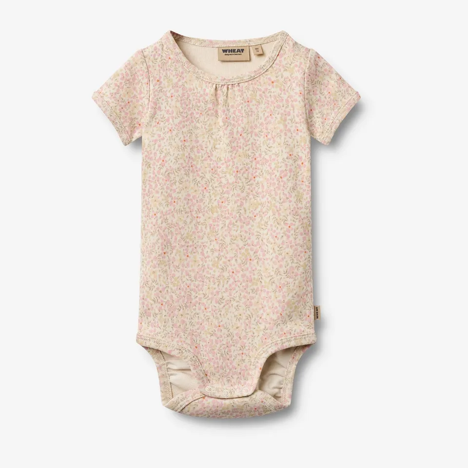 wheat-linette-body-baby-coral-flowers-bio-baumwolle image 1