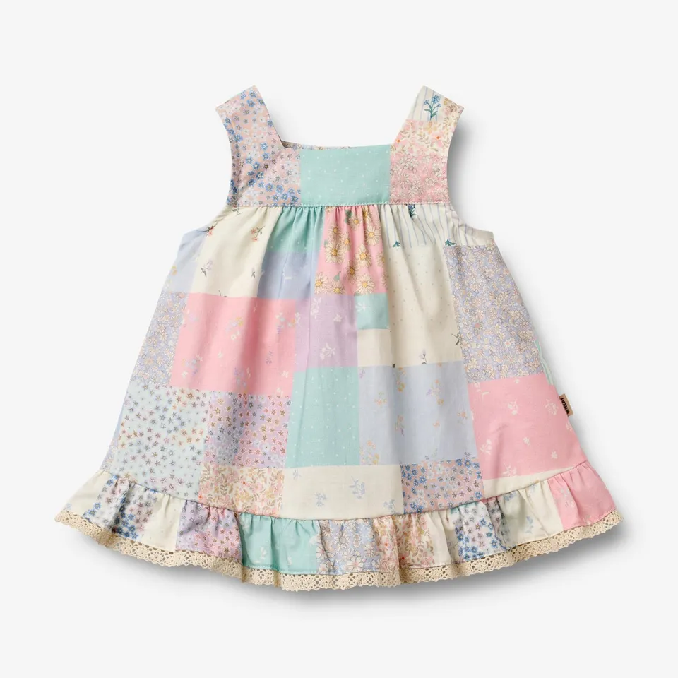 wheat-kleid-ayla-babykleid-patchwork-flowers-bio image 1